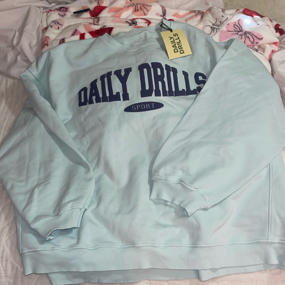 Brand new unworn daily drills sweatshirt